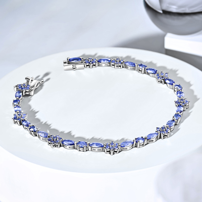 Bracelet with Tazanite stones on table